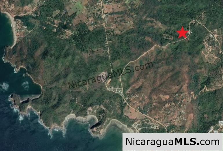 Nestled in the trees minutes to beaches Rancho Papayal Lot 79