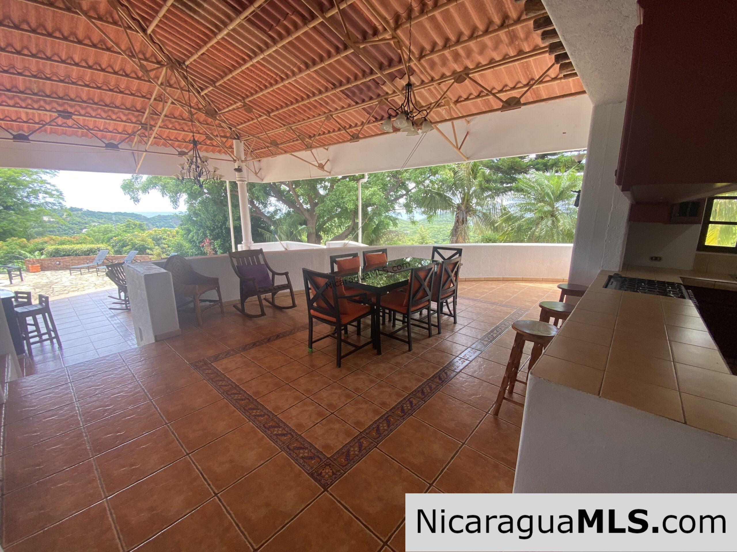 Landmark entertainer home in a quiet, gated development mere minutes from town