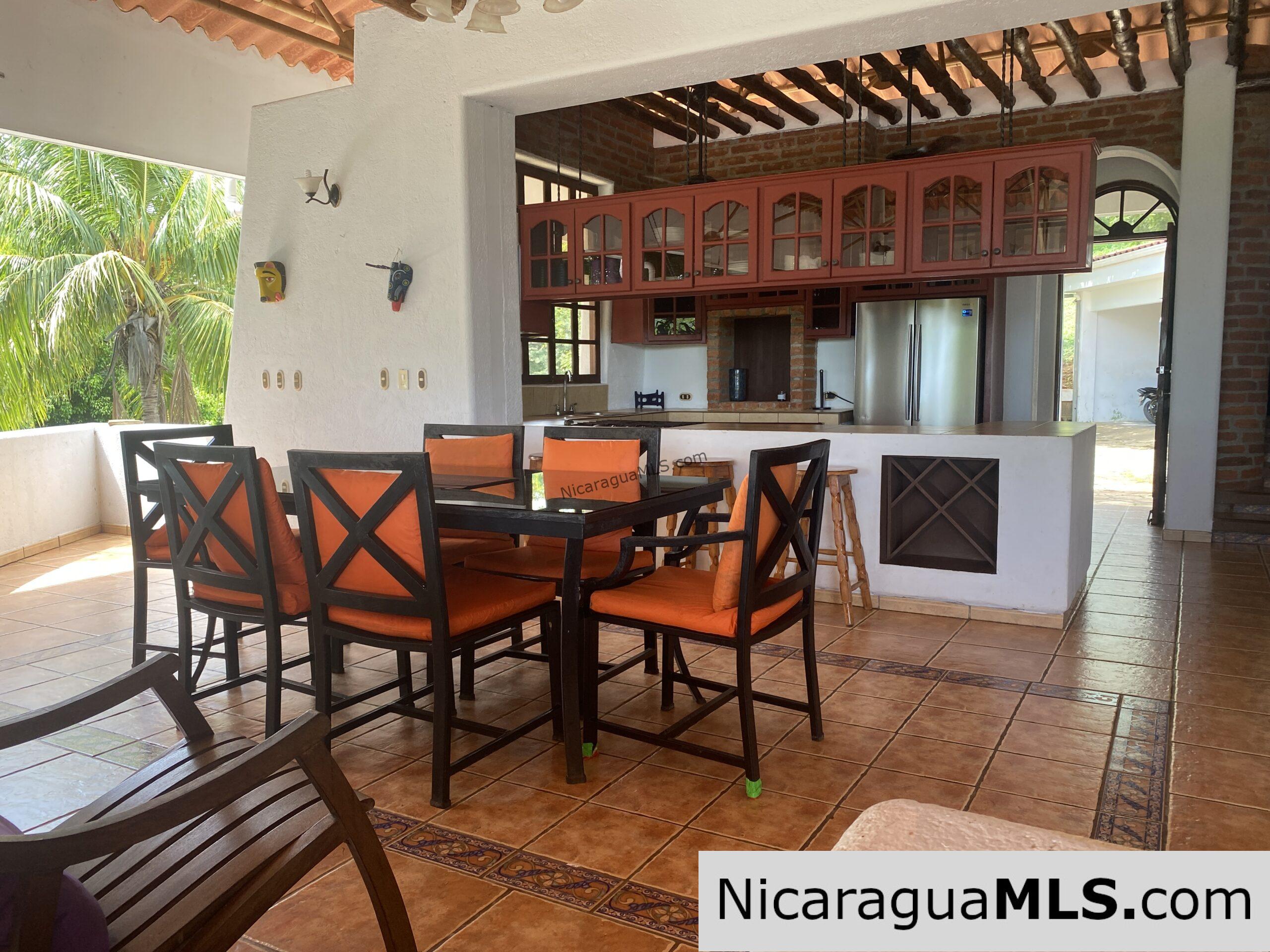 Landmark entertainer home in a quiet, gated development mere minutes from town