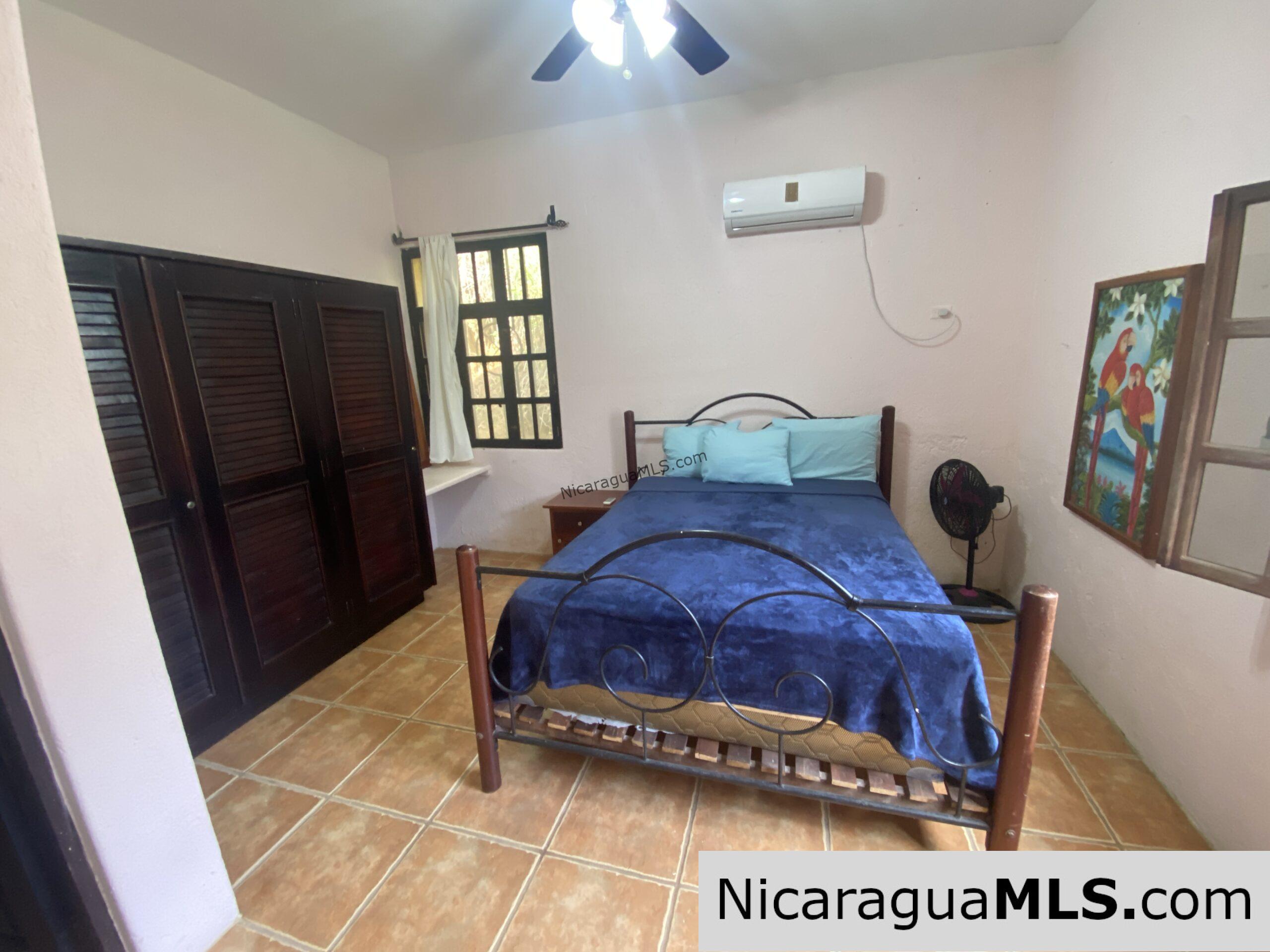 Landmark entertainer home in a quiet, gated development mere minutes from town