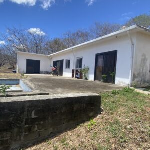 Two homes with private pools on 1.75 Acres (1mz) with loads of potential!